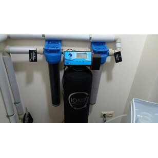 Система умягчения воды в частном доме на клапане WATA